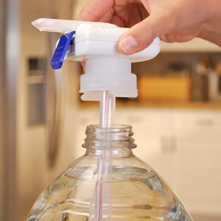 Manual blue and white handle beverage pump with long silicone straws for transferring milk and juice.