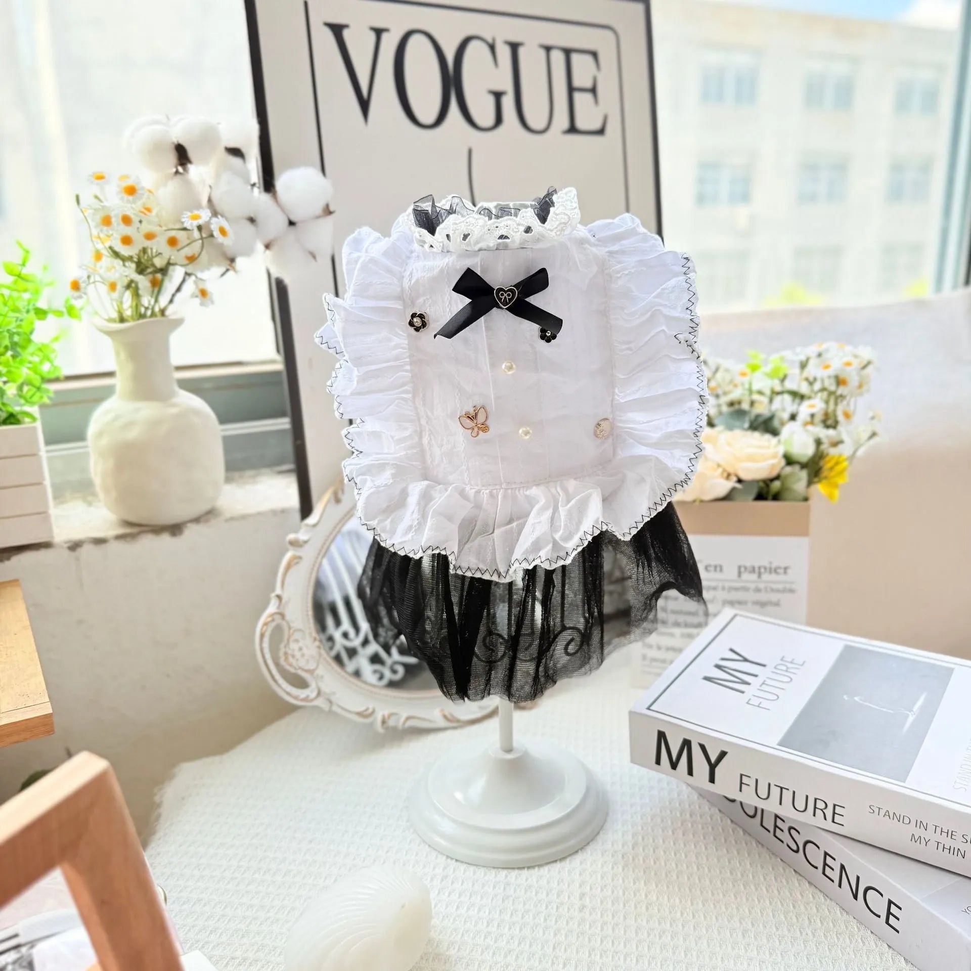White polyester gauze princess-style skirt on a small dog, showing flowing design and fit.