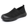 Women's black slip-on cloth shoes with a flat PVC sole and round toe design.