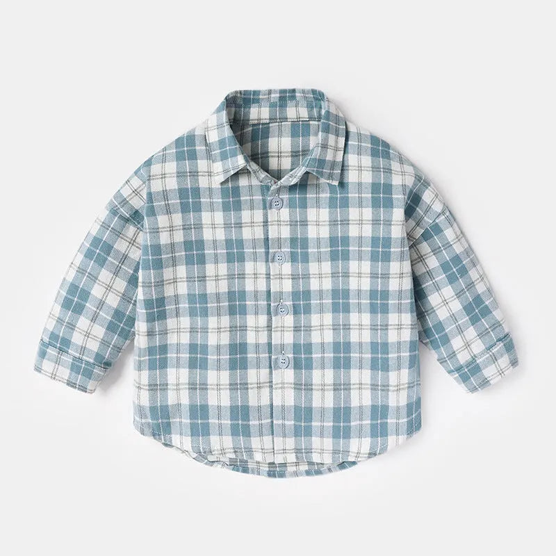 Boy wearing a cotton lattice shirt with animal cartoon print in light blue, long sleeves, casual style.