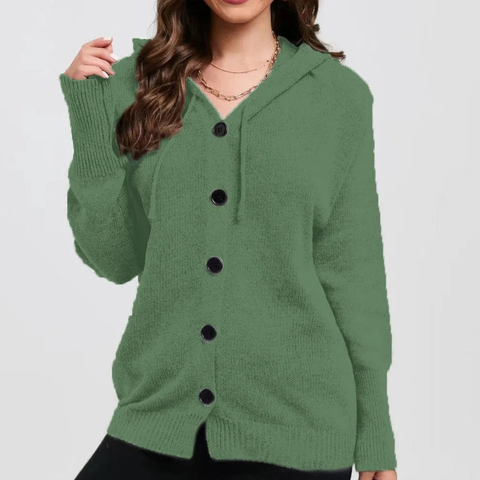 Women's solid colour hooded cardigan in thick cotton fabric showing loose fit and long sleeves