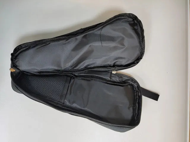 Black cloth storage bag for mobile phone stabilizer, open to show padded foam interior and dual zippers.