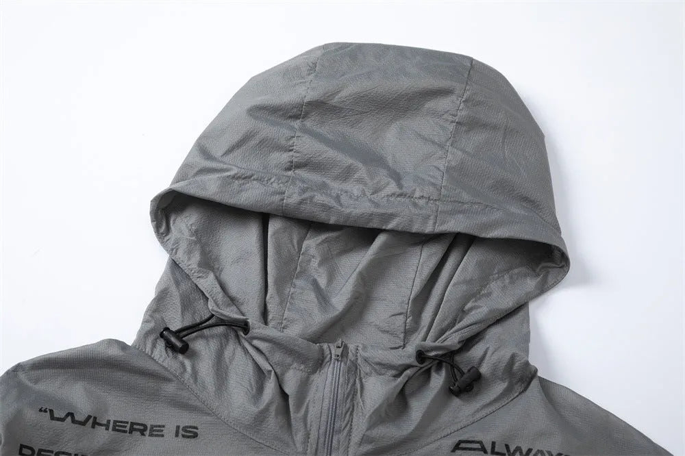 Men's lightweight nylon sun protection jacket with letter print, available in grey or black, sizes M to XXL