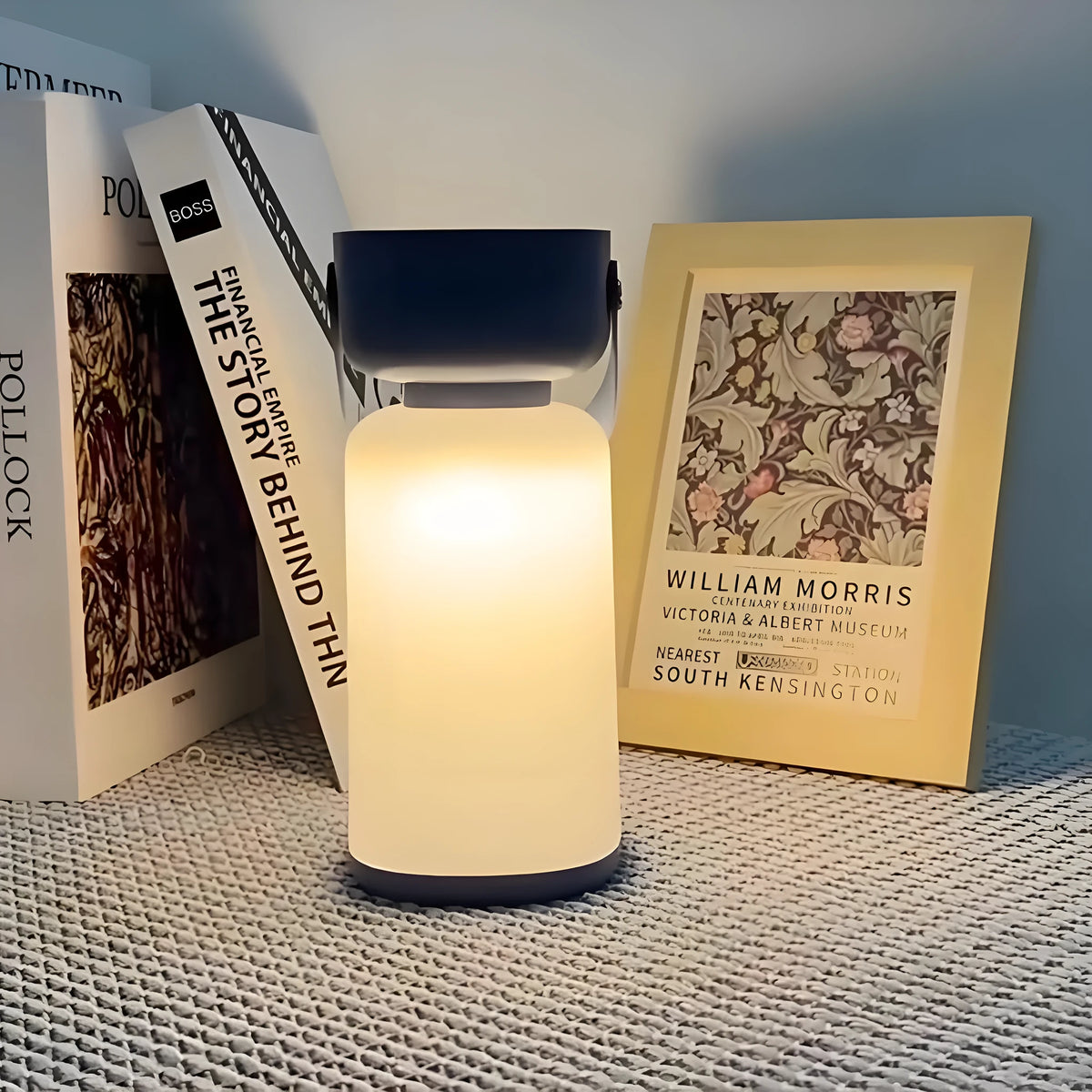 Portable LED camping lantern with USB charging, waterproof design, available in blue or brown, compact modern style.