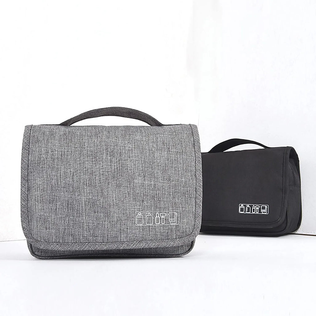 Large waterproof hanging toiletry bag in black with four compartments and metal hook