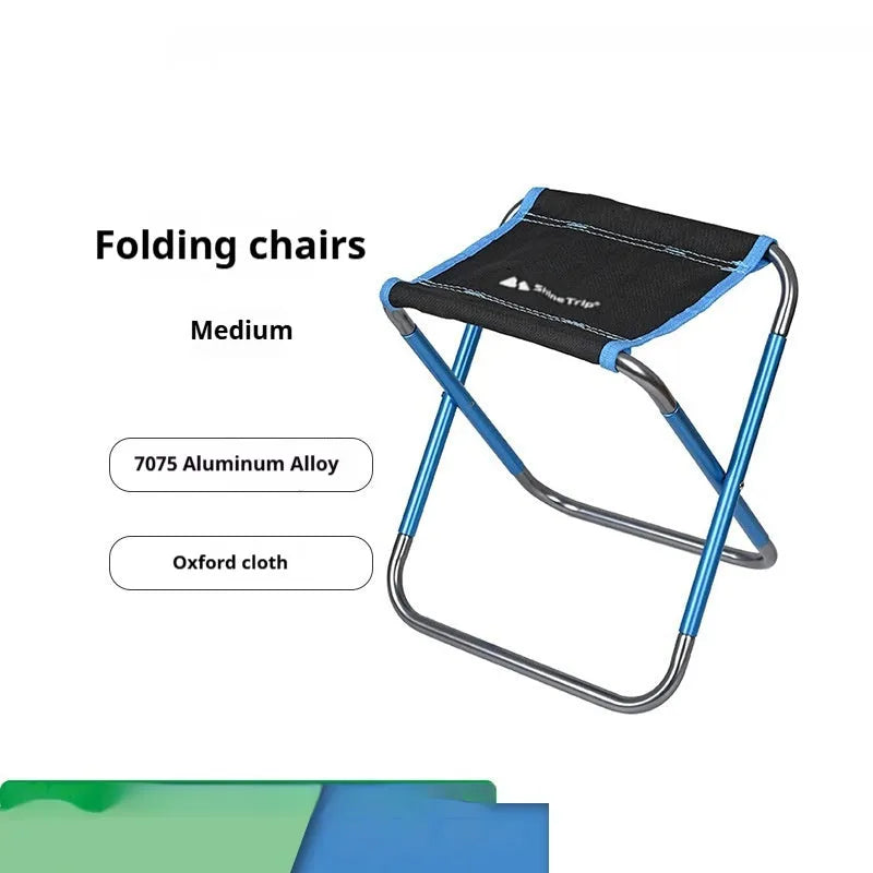 Black folding camp stool with ethnic pattern, made from lightweight aluminium alloy, shown in folded and unfolded states.