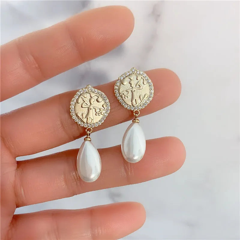 Water drop pearl earrings with micro inlaid zircon, copper geometry design and silver needle option