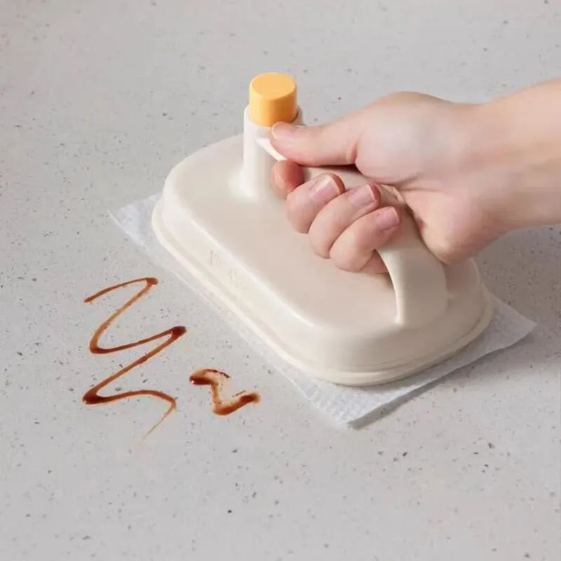 Magic Brush cleaning tool with disposable white rag heads for bathroom tile and glass cleaning.