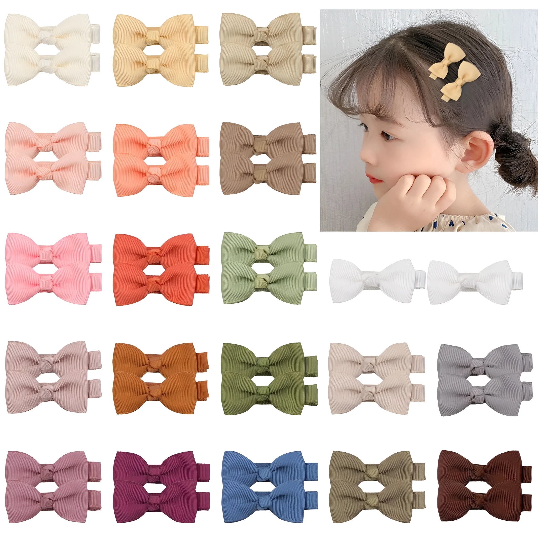 Pastel coloured hair clips, barrettes and bows for babies and toddlers in a set.