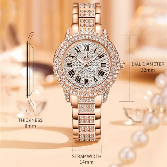 Women's gold alloy watch with diamond-like accents, slim 14mm strap, and 8mm dial on a white background