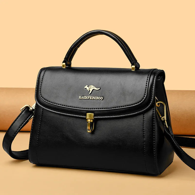 Women's textured PU crossbody handbag in horizontal square shape with rear pocket, black colour