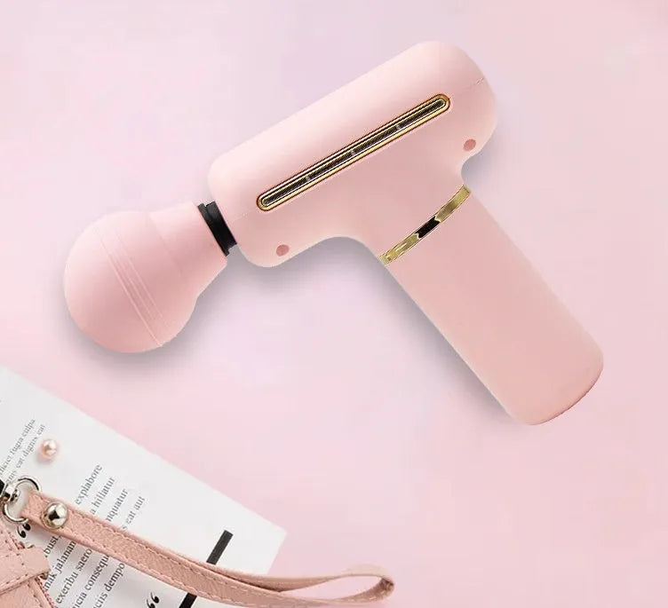 Mini massage gun in green or pink with brushless motor, USB power, 20 x 16.5 x 5.6 cm size, and 327 g weight