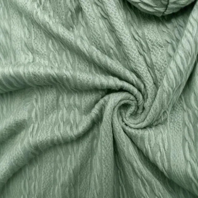 Green women's hooded zip-up sweater coat with a front zipper, shown in a loose, casual fit.