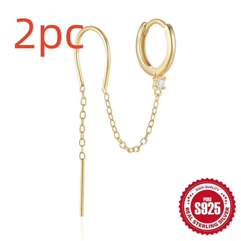 S925 sterling silver ear studs with geometric flower design and tassel chain elements in golden colour