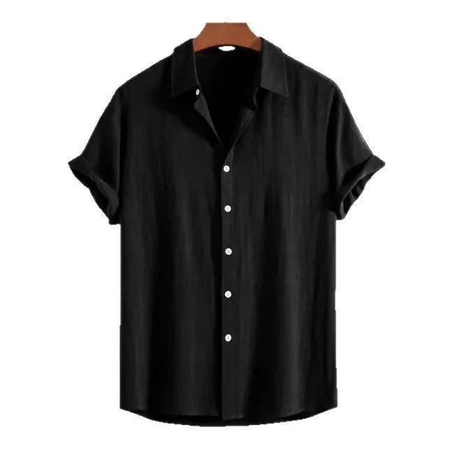 A man wearing a loose-fit, short-sleeve cardigan in a solid colour, suitable for summer.