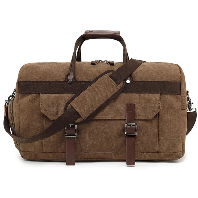 Canvas crossbody travel bag in black with sewing line detailing showing 36-55 litre capacity