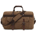 Canvas crossbody travel bag in black with sewing line detailing showing 36-55 litre capacity