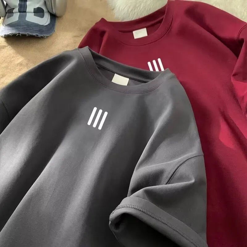 Half-sleeve Milk Silk couple pullover in loose fit with drop shoulder, cartoon print, polyester fabric, available in multiple sizes and colours