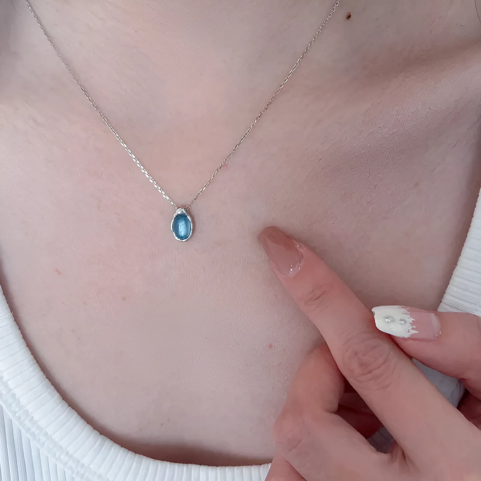 Navy blue water drop pendant copper necklace on woman with adjustable cross chain 41-50cm