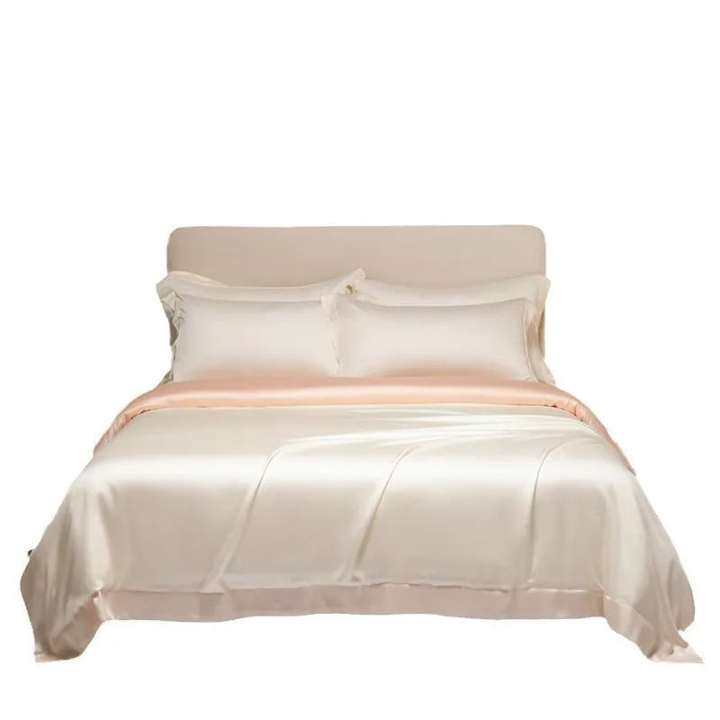 Lenzing Tencel quilt cover and pillowcase set in Aurora Blue, neatly arranged on a bed.
