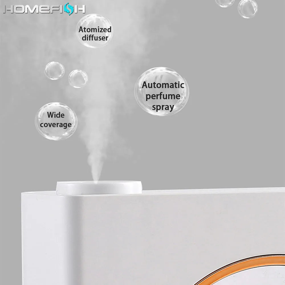 Small white automatic aromatherapy machine mounted on a wall with USB charging cable.