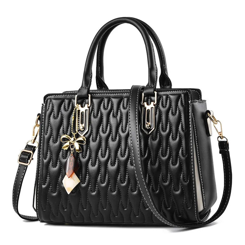 Women's large-capacity polyester messenger bag in black, showing outer pocket design.