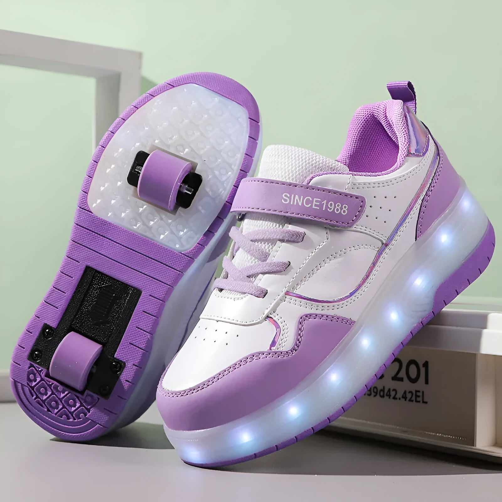 Charging flash roller skates with LED lights in pink, white, black, and purple colours