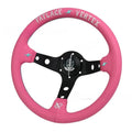 Pink leather steering wheel cover with embroidery detail and aluminium bracket