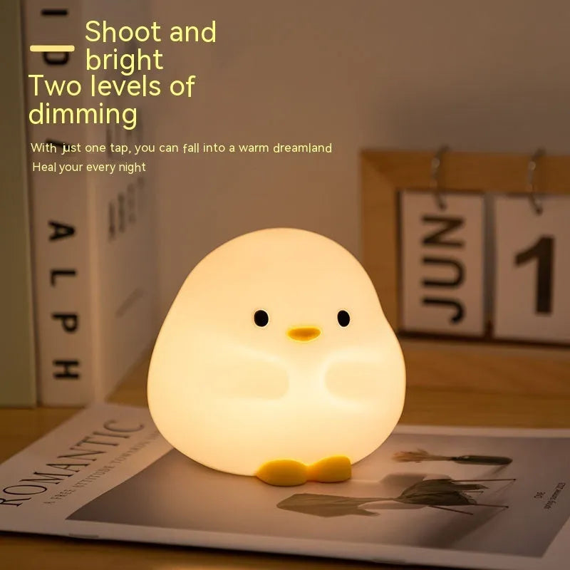 Cute duck LED night lamp in silicone with USB charging, touch sensor, and 125mm x 105mm x 110mm size