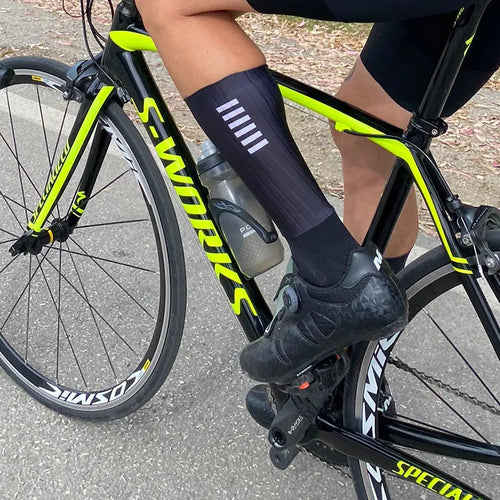 Athletic sports socks for running and cycling in orange, black, purple, white, grey or dark blue