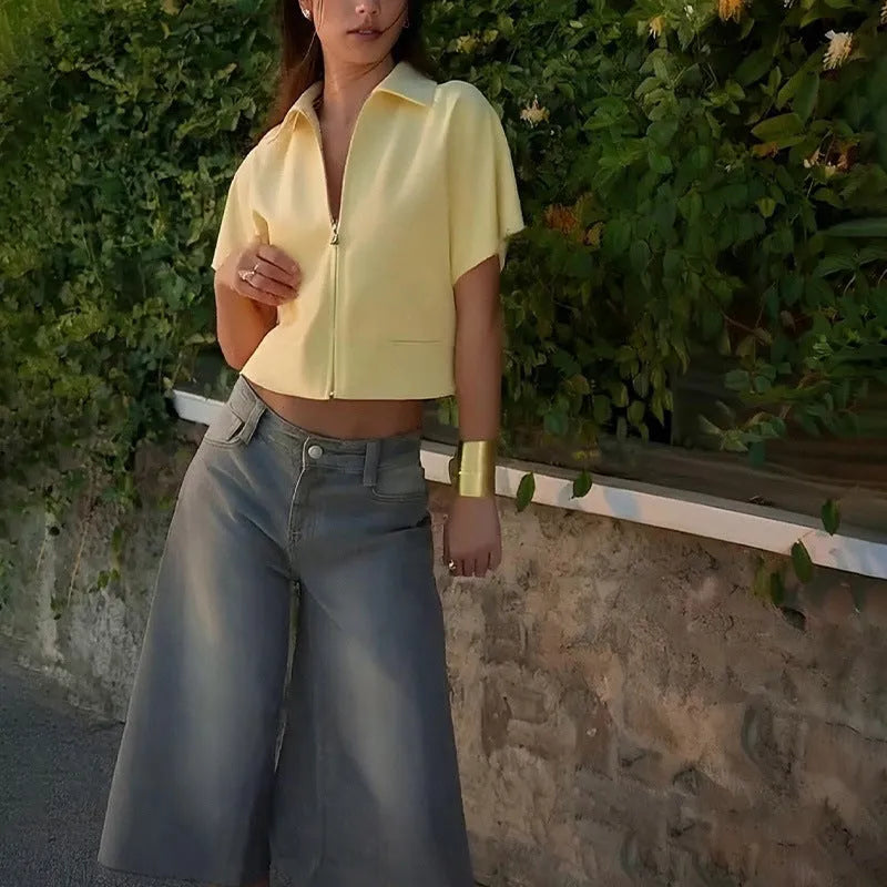 Loose-fit short-sleeve polyester casual top on a hanger in yellow.