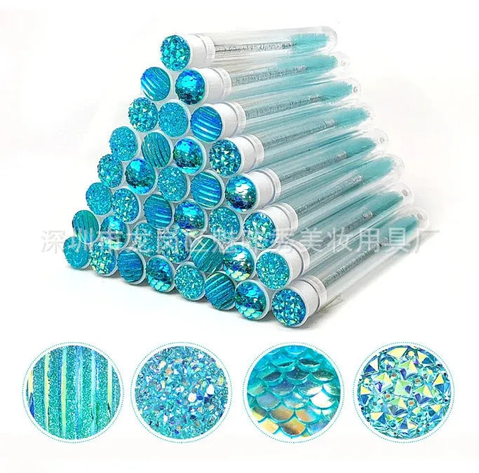 Disposable eyelash spoolie brushes in coloured plastic tubes for mascara and extension cleaning
