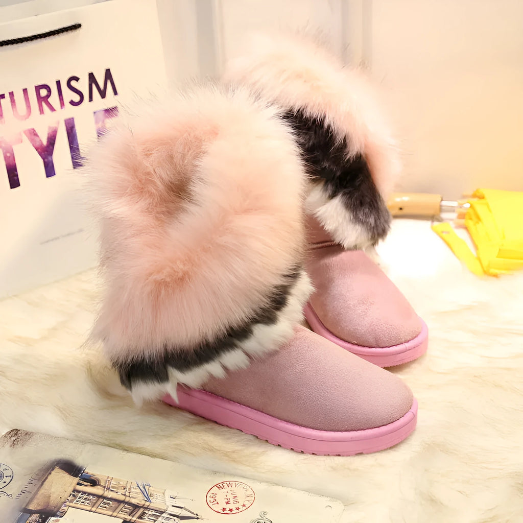 Women's winter snow boots with suede upper, fluffy fox fur trim, and non-slip rubber sole in black colour