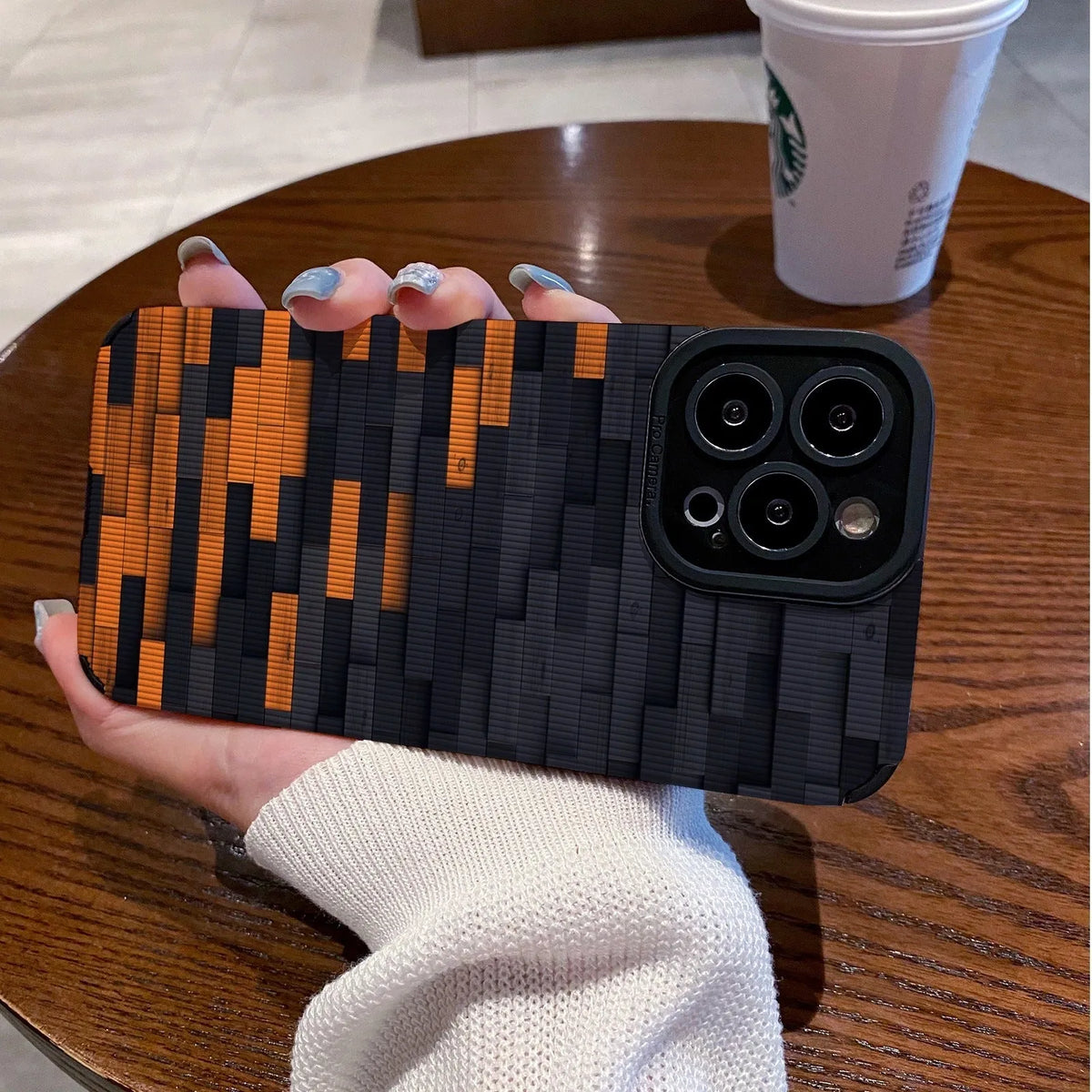 Orange and black cartoon phone case with stitching, all-inclusive soft leather for iPhone
