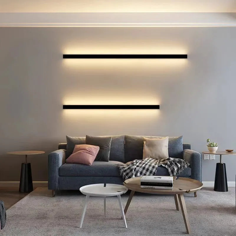 80cm black aluminium LED strip wall lamp with touch control panel on a modern interior wall.