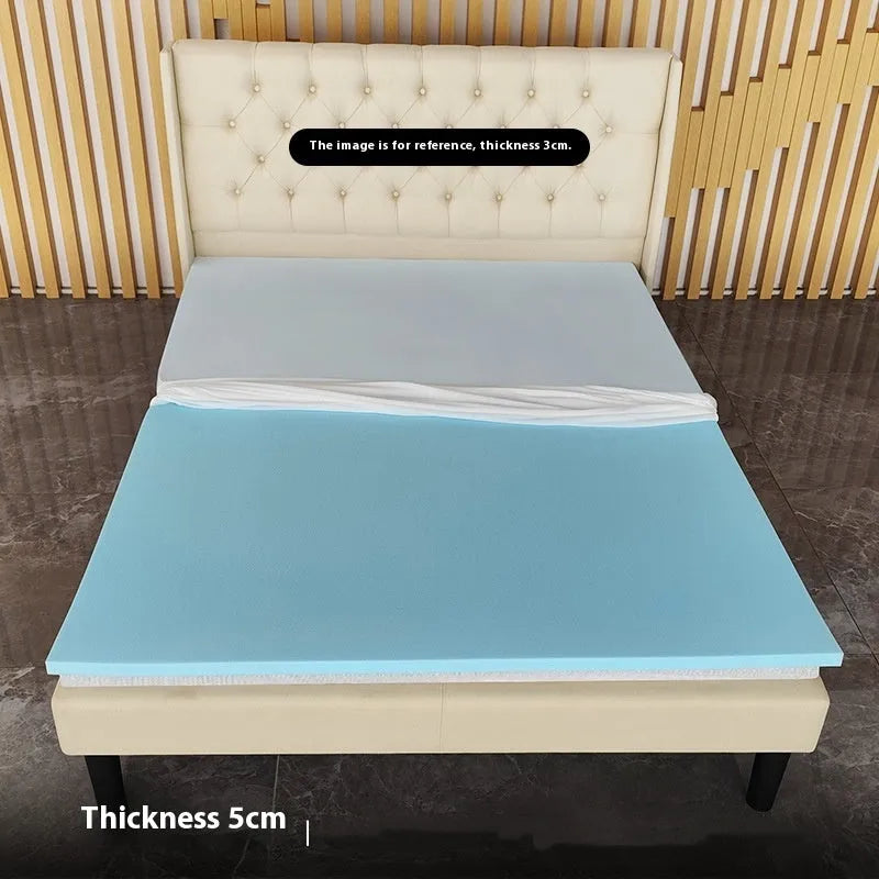 Thin gel memory cotton tatami mattress on a floor, showing its slim profile and textured cover.