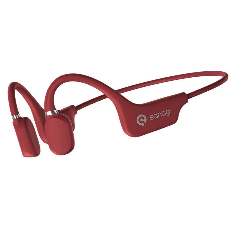 A person wearing bone conduction Bluetooth headphones with a wireless neckband sensor during a run.