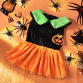 Small dog wearing a crystal velvet Halloween pumpkin skirt costume next to a Halloween sweater pet outfit.