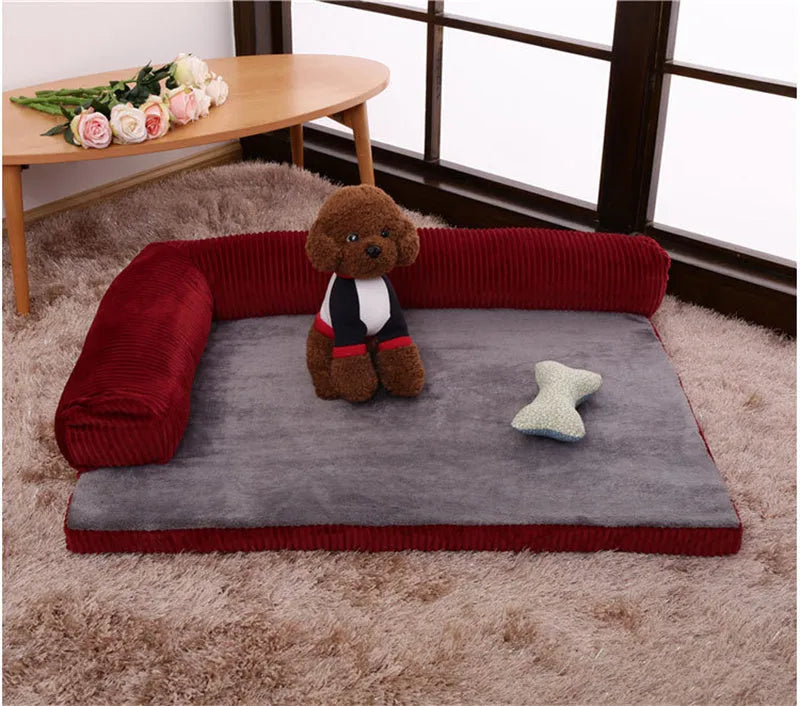 Corduroy bolster dog bed in grey colour, showing its non-slip base and high sides.