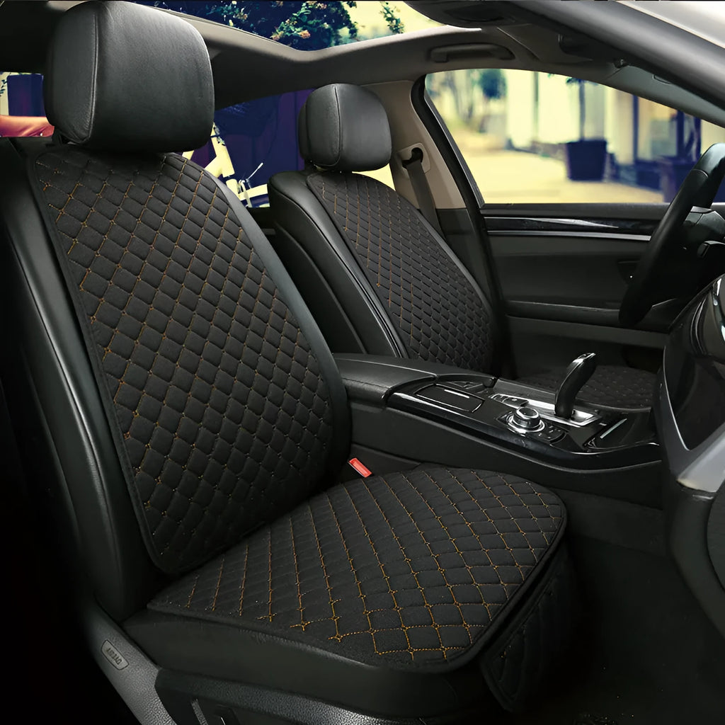 Linen universal car seat cushion in black with decorative red thread pattern on base.