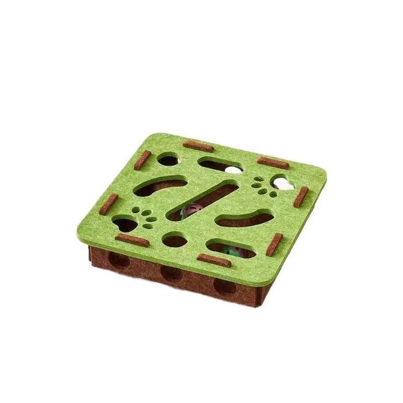 Green brown handmade felt box cat toy with holes for hide-and-seek play.