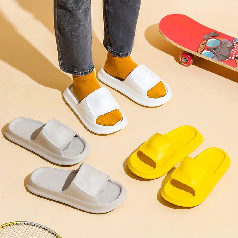 Pair of thick-soled EVA flip flop slippers in a colour option, showing non-slip tread pattern.