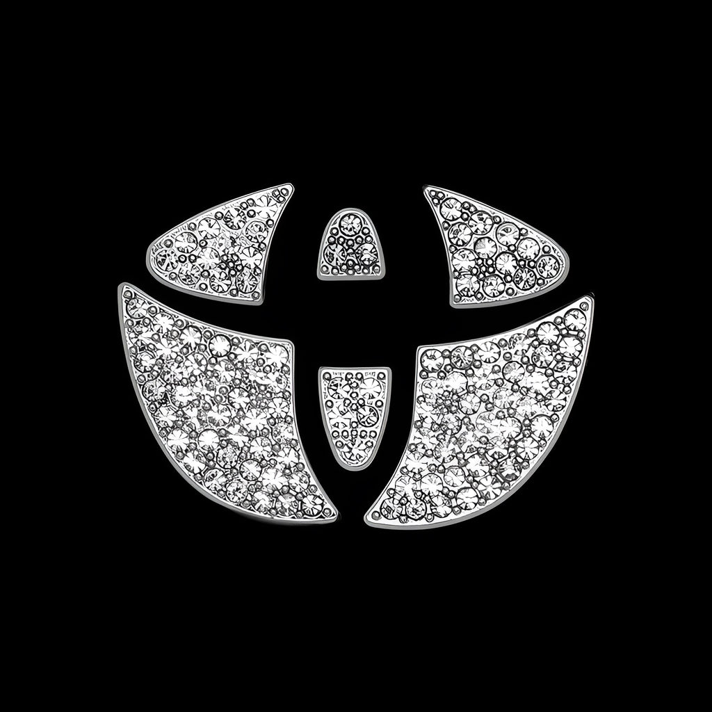 Zinc alloy diamond pattern decorative sticker for a Toyota car steering wheel.
