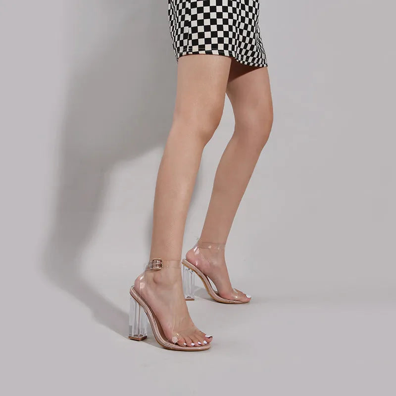 Apricot women's sandals with clear PVC glass high heel and ankle buckle strap.