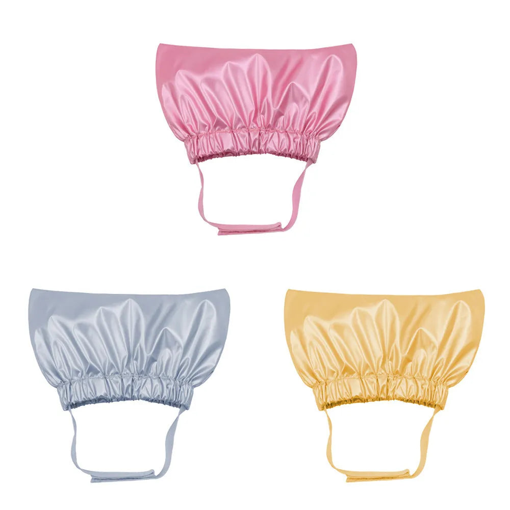 Adjustable waterproof shower cap for pet ear protection in silver, pink, and gold colours