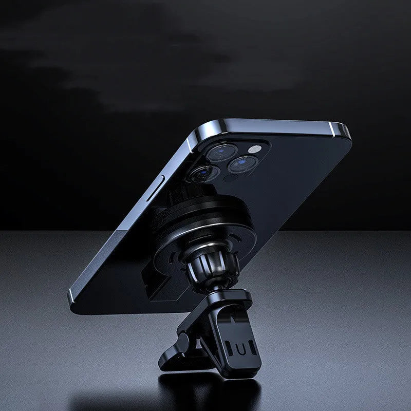 White magnetic wireless charging stand holding a mobile phone at an angle.