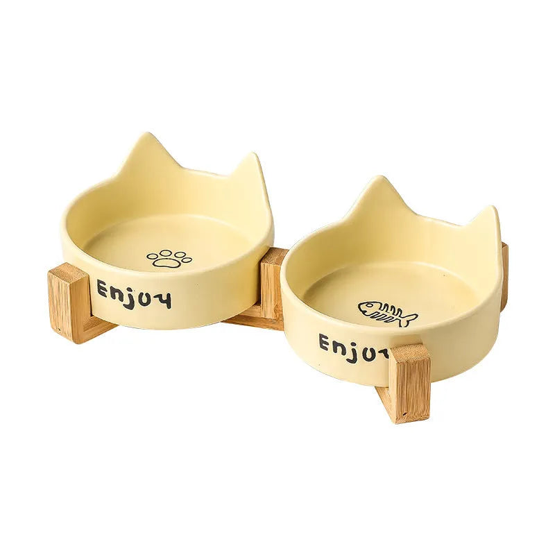 Porcelain cat bowl with wooden anti-tumble frame in cat ear design