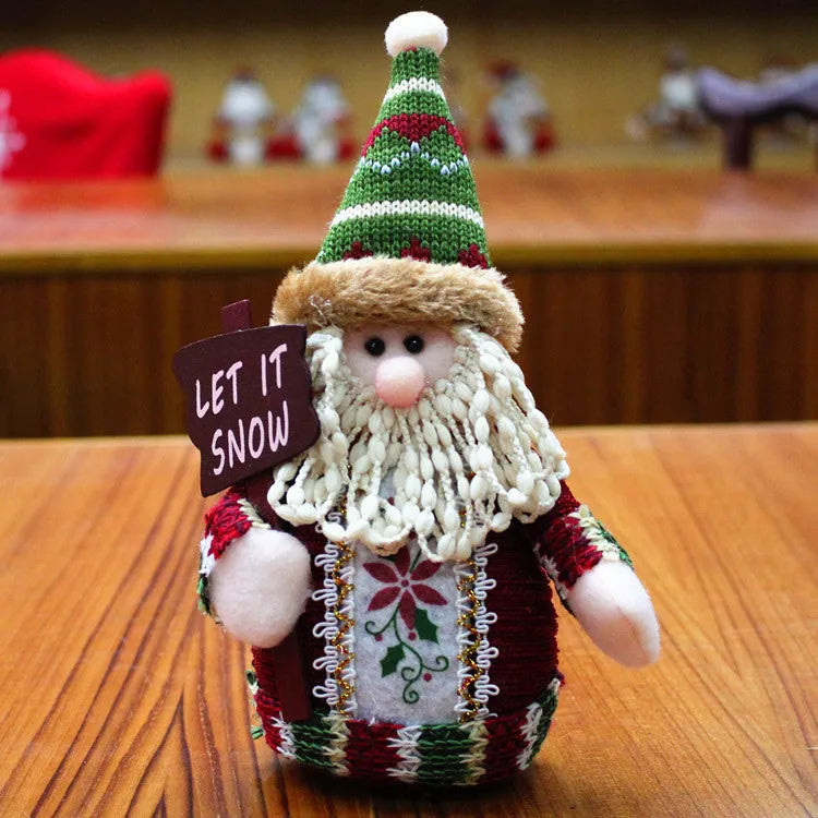 Red, green and white flannel Christmas snowman ornament measuring 18cm by 13cm