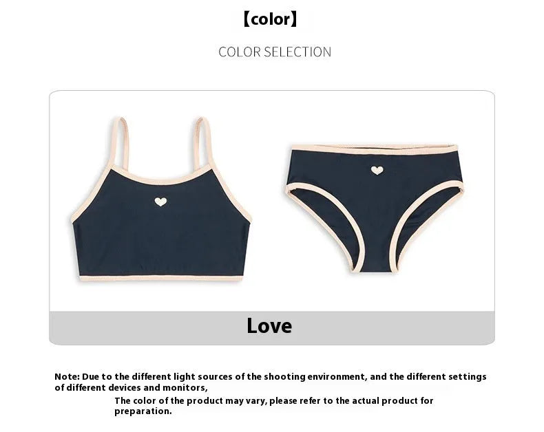 Dark blue split colour baby girl's swimsuit with briefs and split design for swimming.