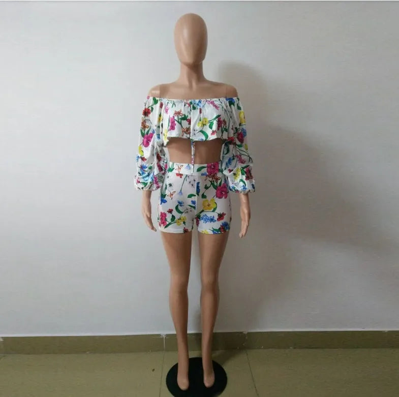 Multicolour digital print women's two-piece tracksuit with pile sleeves on the short top and matching shorts.
